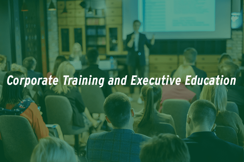 A man leading a conference discussion with Corporate Training overlay text