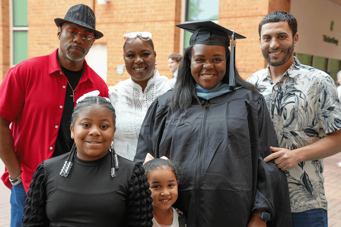 unc charlotte graduate with family